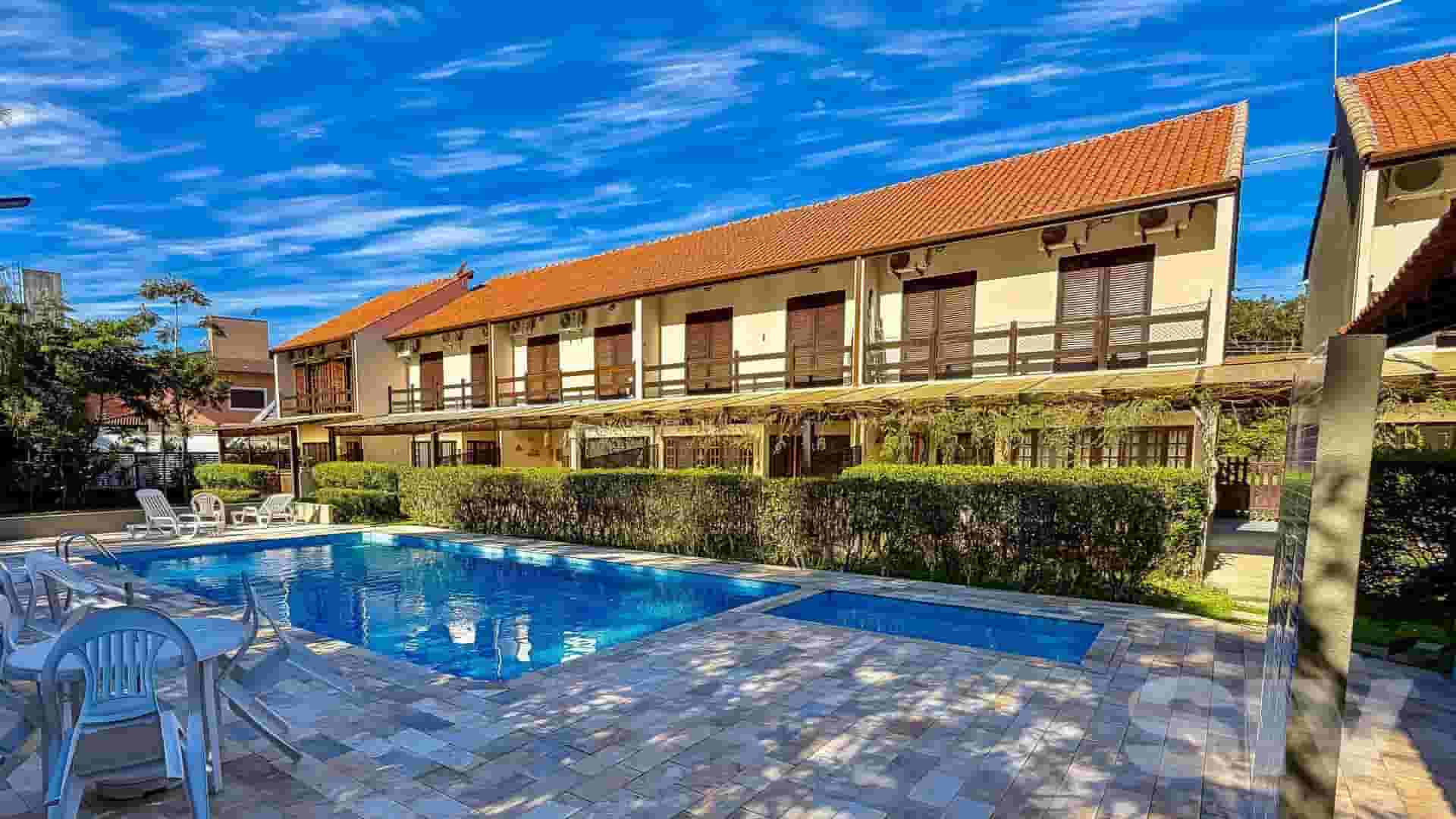Village com 3 dormitórios à venda, 129 m² por R$ 1.400.000,00 - Riviera - Módulo 30 - Bertioga/SP - Imagem 2