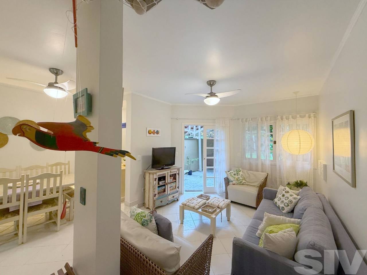 Village com 3 dormitórios à venda, 128 m² por R$ 2.050.000,00 - Riviera Módulo 21 - Bertioga/SP - Imagem 2