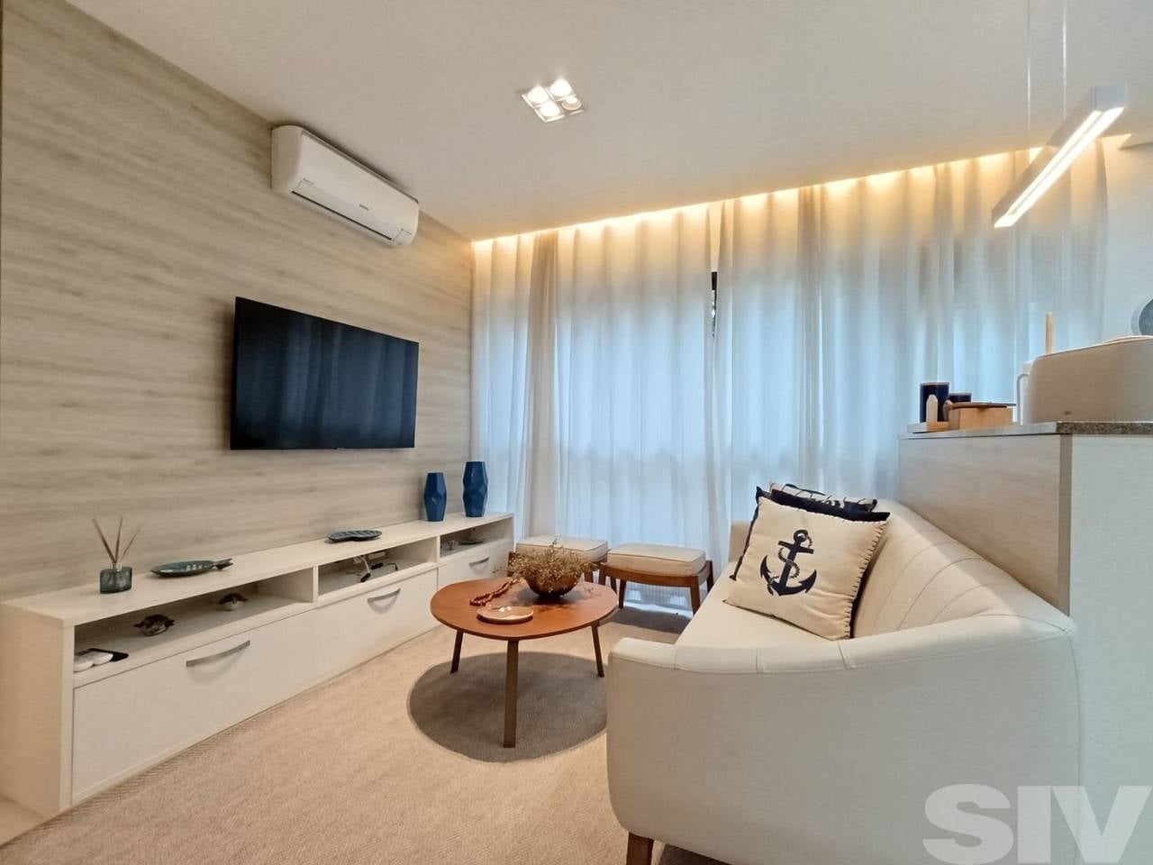 Village com 3 dormitórios à venda, 70 m² por R$ 1.650.000,00 - Riviera Módulo 24 - Bertioga/SP - Imagem 1
