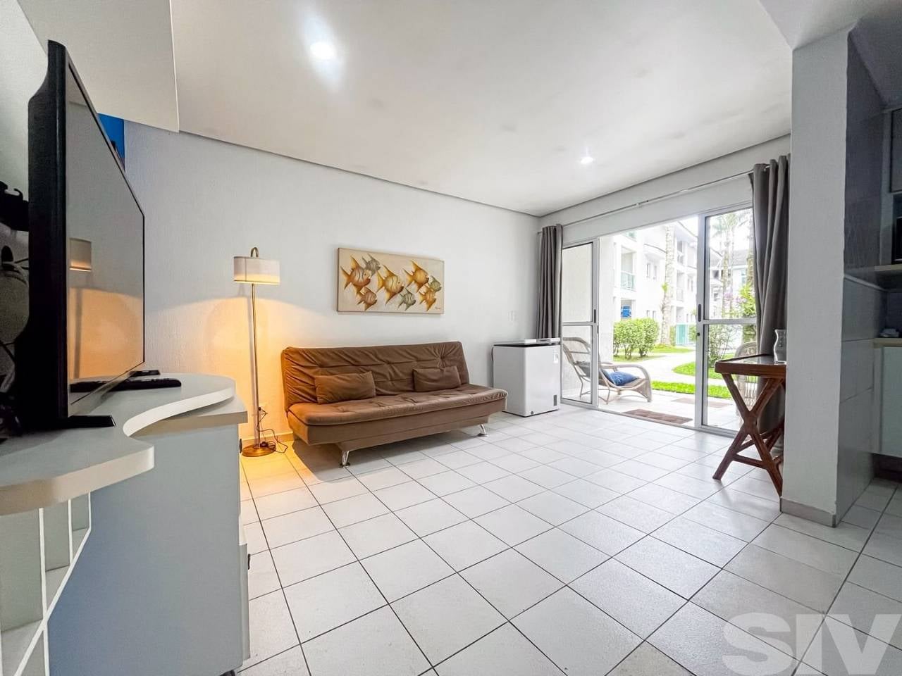 Village com 1 dormitório à venda, 54 m² por R$ 850.000,00 - Riviera Módulo 30 - Bertioga/SP - Imagem 1