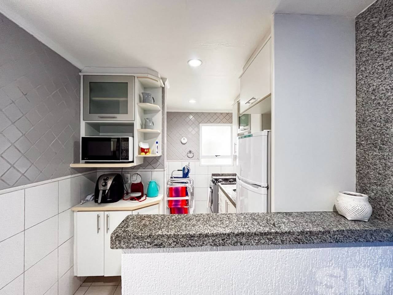 Village com 1 dormitório à venda, 54 m² por R$ 850.000,00 - Riviera Módulo 30 - Bertioga/SP - Imagem 2